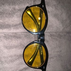 Black yellow lens glasses